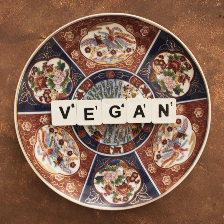 Colorful ceramic plate with vegan message